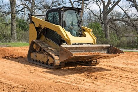 grading with skid steers